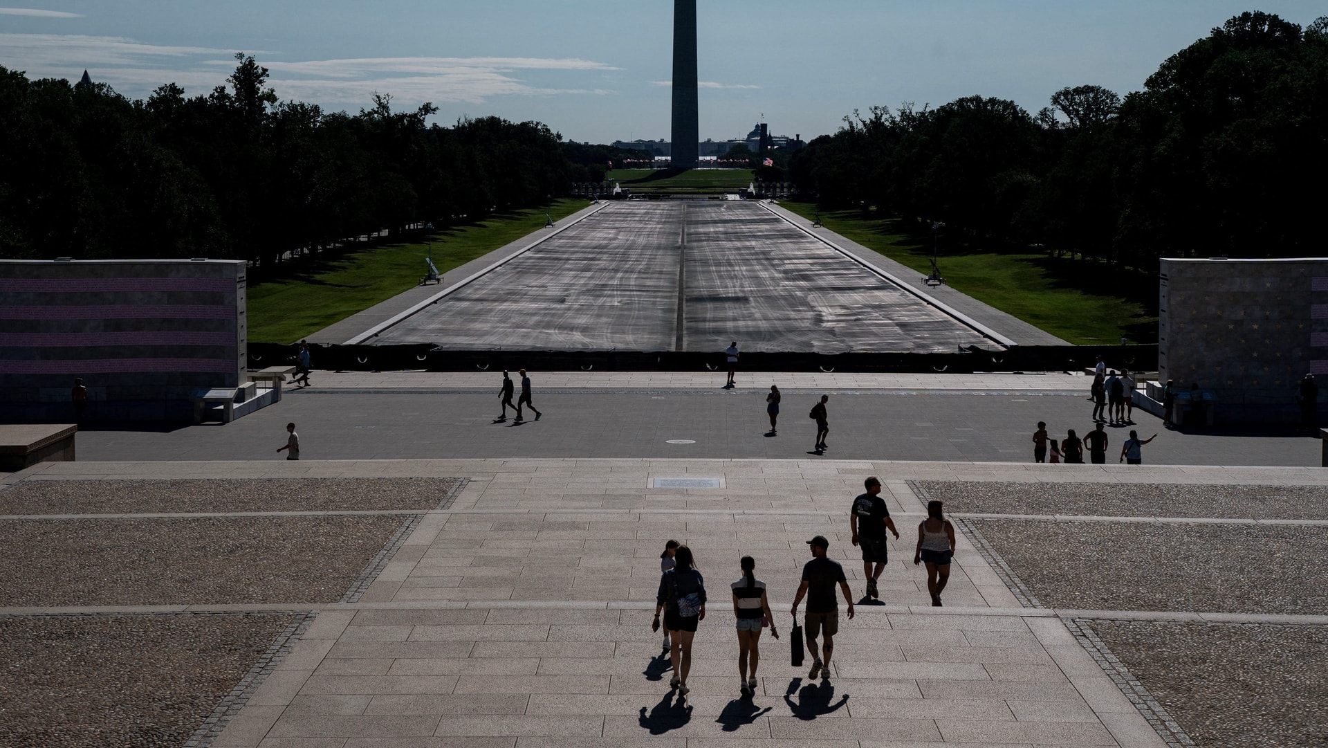 DOJ drops Reflecting Pool 'vandalism' charges, citing contractor error for damage.
